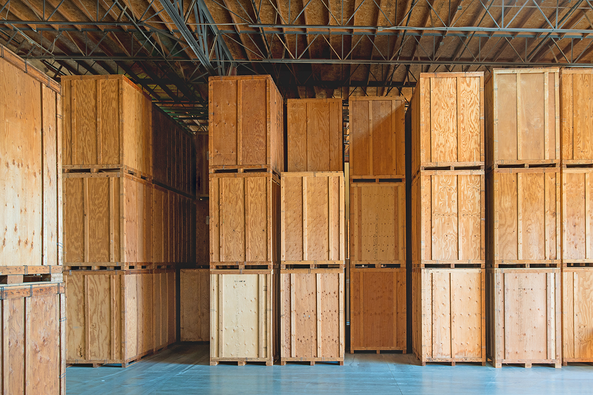 Storage solutions with crates made of wood interior. Logistics and Distribution